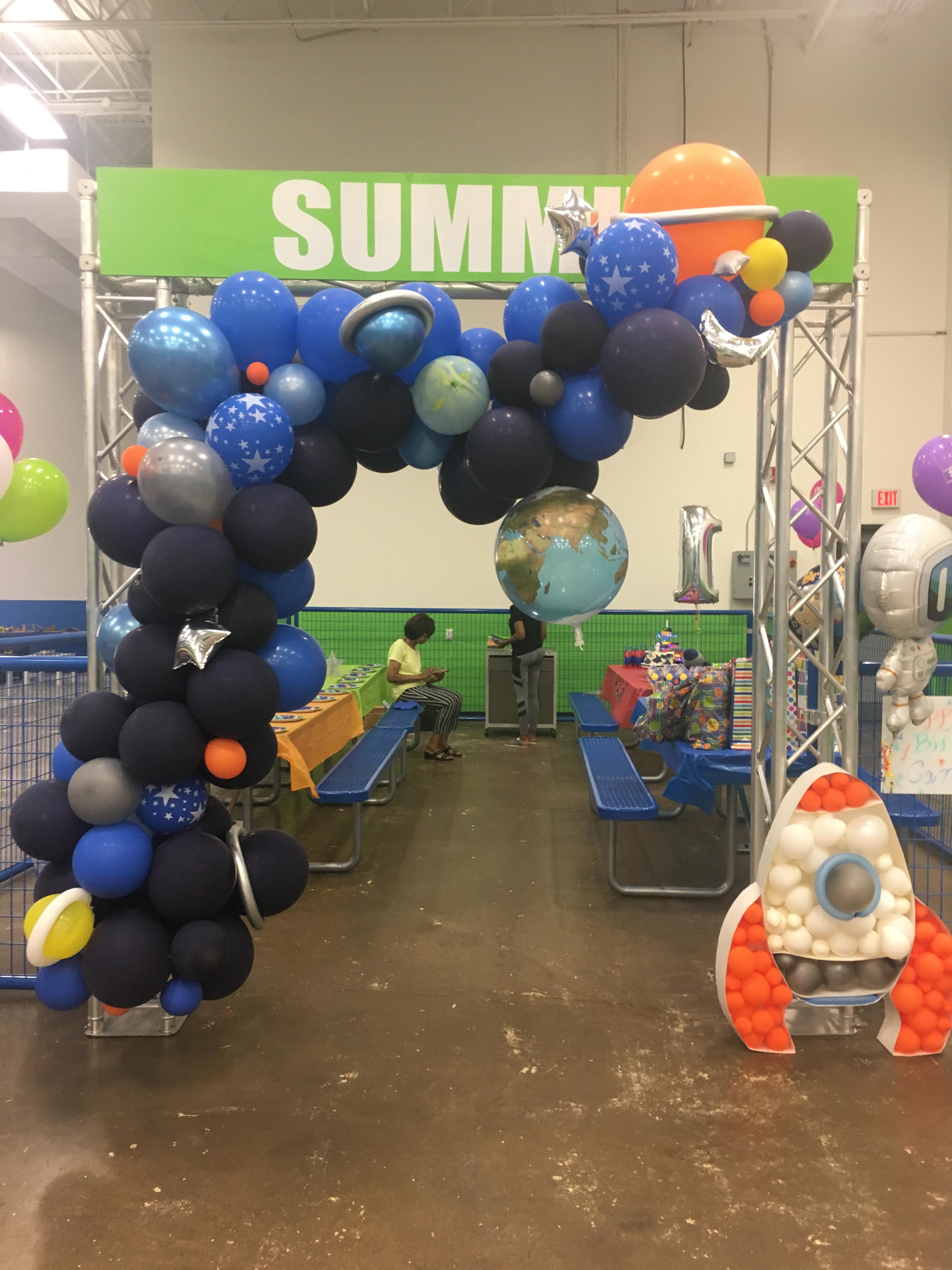 Space themed with balloon arch, multi-colored