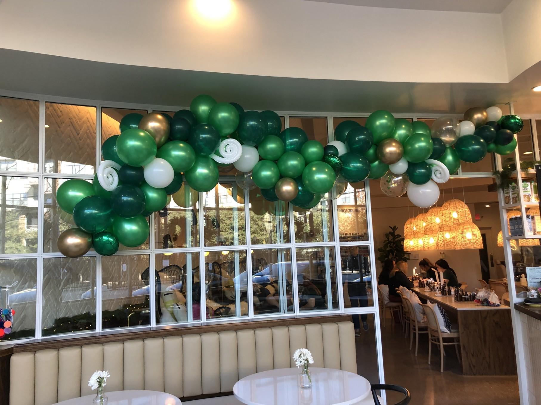 Multi-colored balloon arch for nail salon